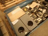 a box full of electrical equipment sitting on a pallet