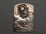 an image of a metal plaque with a man in the clouds