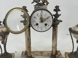 a clock that is sitting on top of a table