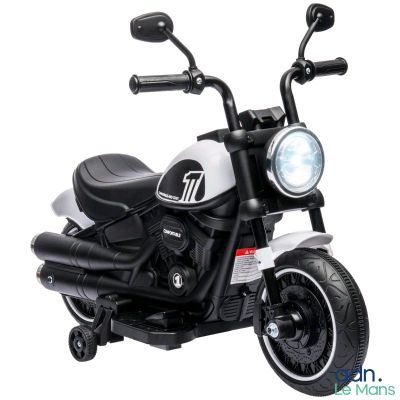 a black and white motorcycle with a light on it