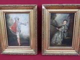 two framed paintings of a man and a woman on a red background