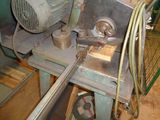 a picture of a machine that is working on a piece of wood