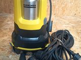 a yellow and black submerst with a cord attached to it