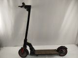 an electric scooter sitting on a white surface with a white background