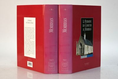 un livre rouge sur lequel figure l'image d'une église