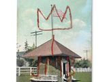 a postcard of a gazebo with a flag on it