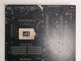 a close up of a computer motherboard with a cpu on it
