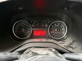 a close up of a car dashboard with a speedometer