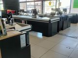 an image of a store with a counter and a counter top