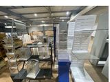 a picture of a store with a lot of items on the shelves