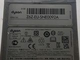 the back side of a laptop computer with a sticker on it
