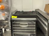 a toaster and toaster sitting on a counter in a kitchen