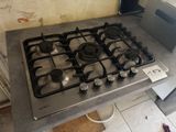 a stove top that is sitting on a counter