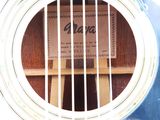 a close up of a guitar with a label on it