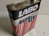 a can of alcohol that is sitting on a table