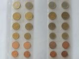 two bags of coins with labels on them sitting on a table