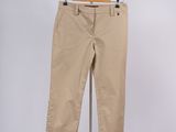 an image of a pair of beige pants on a stand