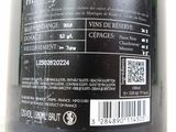a bottle of wine on a table with a barcode on it