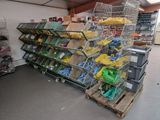 many cages filled with different types of items in a store