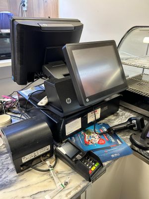 an image of a counter with a lot of electronics on it
