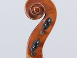 an old violin with a wooden back and a long neck