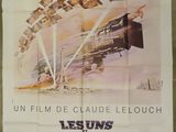 the poster for the movie les suis les autress is hanging on the wall