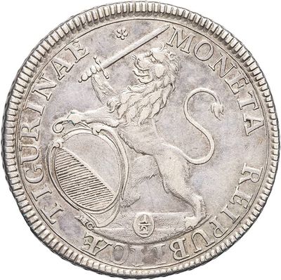 a close up of a silver coin with a lion on it ' s back
