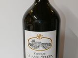 a bottle of wine that is sitting on a table