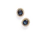 a pair of sapphire and diamond earrings