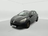 the black car is parked in a white room with a white floor