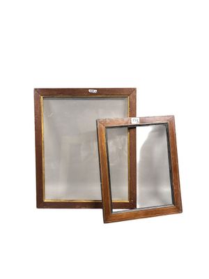 an image of a pair of wooden frames with a glass window