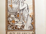 une photo d'un vieux livre sur laquelle figure l'image d'une femme
