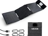 a solar charger and a pair of scissors next to it