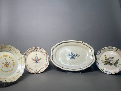 several plates are lined up in a row on a gray surface