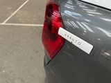 a sticker on the back of a car that says uppaunto