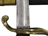 a close up of a sword with a gold handle