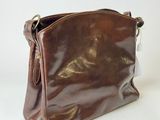 brown leather handbag on a white background