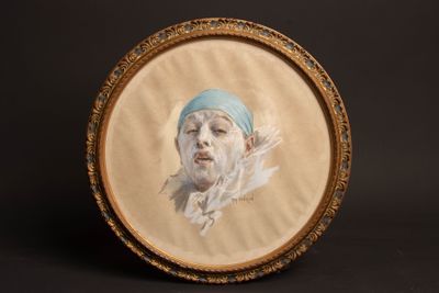 painting of a woman with a blue headband in a gold frame