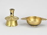pair of brass candlesticks and a bowl