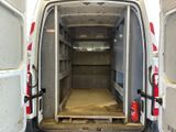 a white van that is parked in a garage