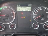 a close up of a car dashboard with various gauges and numbers