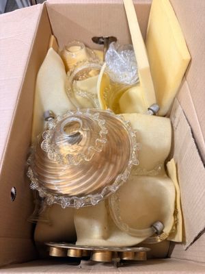 a cardboard box with a bunch of food inside of it