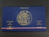 a close up of a blue box with a gold lion on it