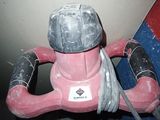 a pink toy that is sitting on the floor
