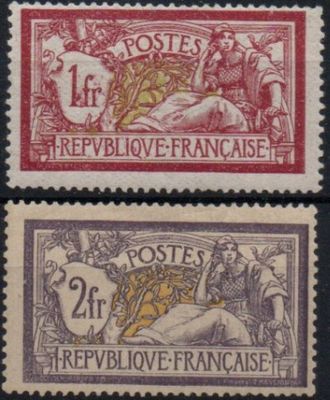 a couple of stamps that are sitting on top of each other
