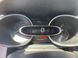 a close up of a car dashboard with a speedometer and gauges