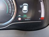 a car dashboard with a digital display on it