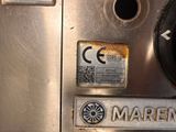 a close up of a machine with a lot of stickers on it