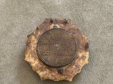 a plaque on the ground that says it ' s time to get back