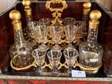 a box with a set of wine glasses and a decanter on it